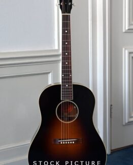 image of Model: Jackson Browne Siganture Body Type: Round Shoulder Top: Adirondack Red Spruce Back and Sides: Farmed English Walnut Construction: 1930s Gibson Jumbo body style, Body depth: 4.55" / 116 mm at head block, 4.83" / 123 mm at tail block Binding: Multi-ply Top Binding, Single Ply Back Binding Rosette: Traditional 3 ply Bracing: Scalloped Red Spruce Top Bracing: (1930's X-Braced) Neck: 1-piece Mahogany Profile: Modified "V" Profile Thickness: 1.805" at Nut Truss Rod: Single Action Joint: Compound Dovetail Construction: Joint at 12th Fret Adhesive: Hide Glue Fingerboard: Rosewood Frets: 21 Scale Length: 24 3/4" Radius: 12" Fret Wire: Gibson Montana standard Inlays: Abalone slotted diamonds on fingerboard Nut: Bone Width: 1.805" / 46 mm Headstock: Traditional Tapered 1930's Gibson Inlay: Mother of Pearl Gibson Peghead logo Truss Rod Cover: Black Tuning Keys: Gold Waverly with Ivoroid buttons Bridge: Rosewood Type: Traditional Rectangle with open ended saddle slot Bridge Pins: Traditional Pickguard: Firestripe Pick Guard Strap Buttons: End Pin Strap Button Finish: Sealer: Hand Sprayed Nitrocellulose Lacquer Electronics: Trance Audio Amulet True Stereo Case: Gibson Custom